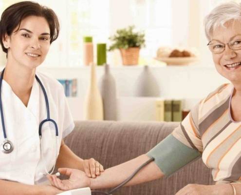 doctor with elderly woman