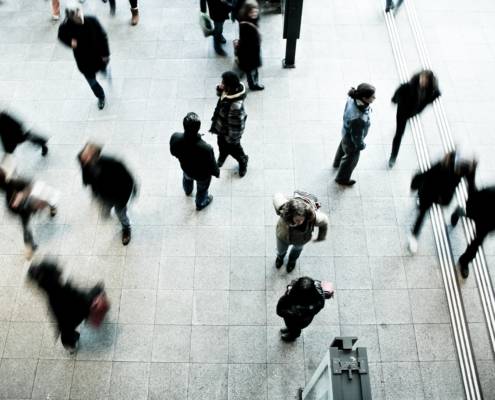 people walking blurry