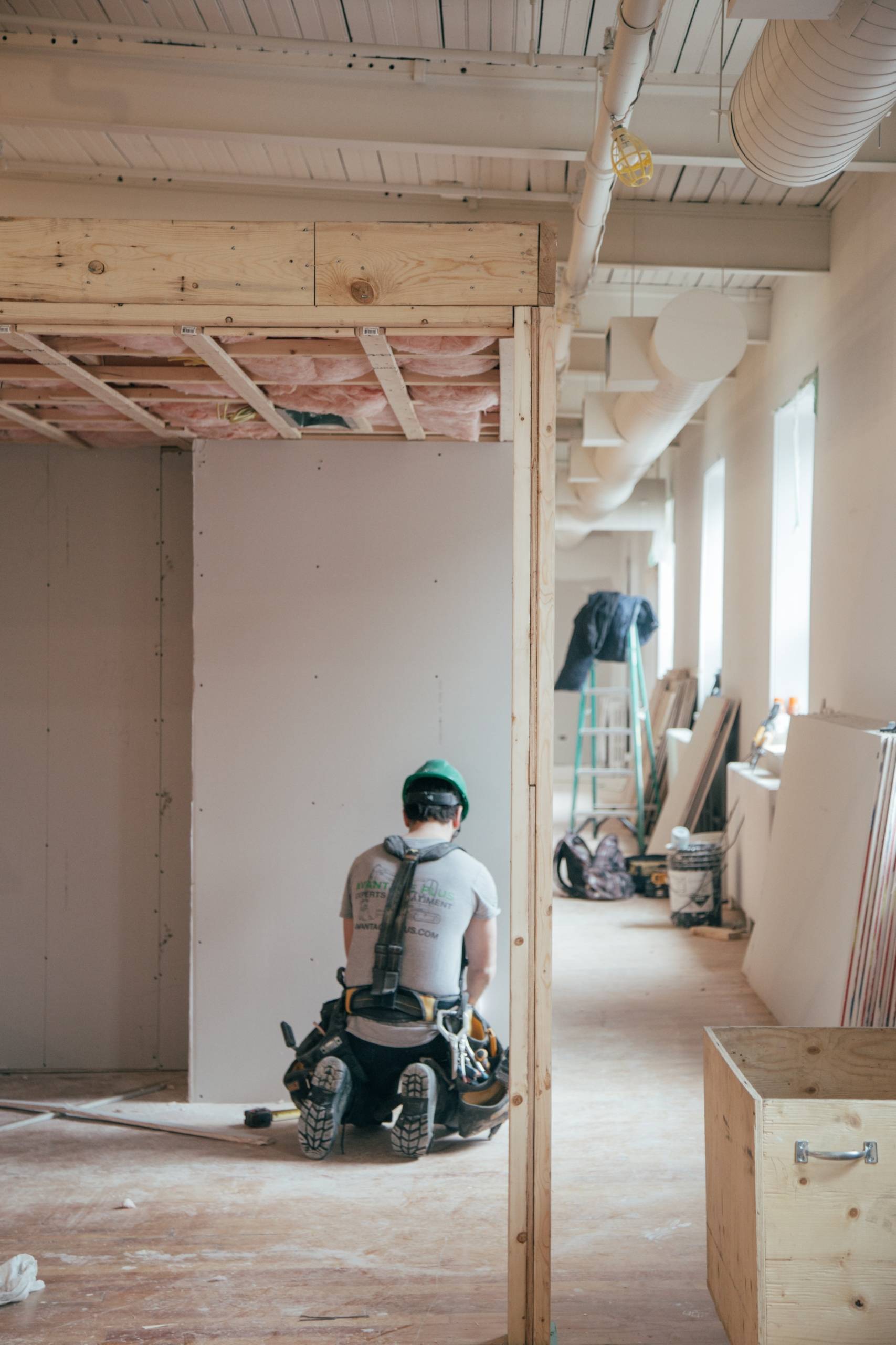 Construction worker in unfinished home