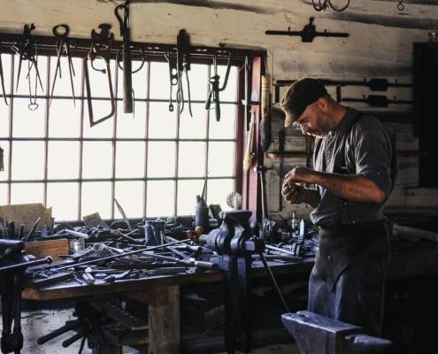 blacksmith with many tools